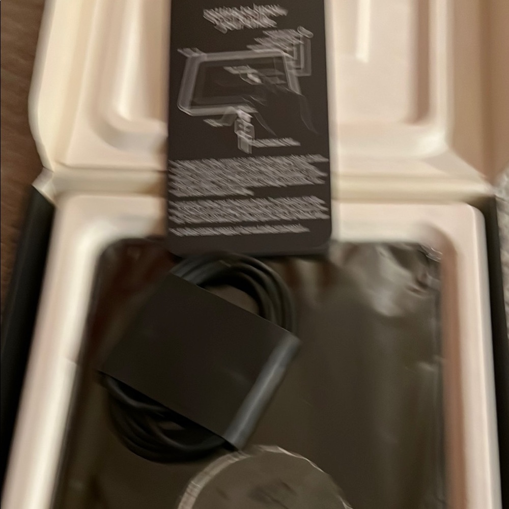 Black Electronic Device with Cable